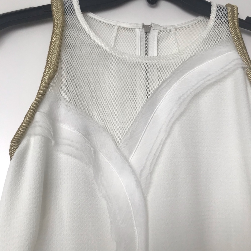 Mini dress with mesh back gold roped sleeves